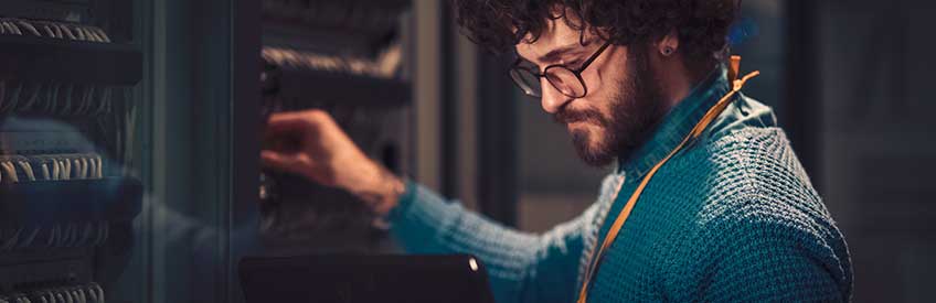 Man working in server room