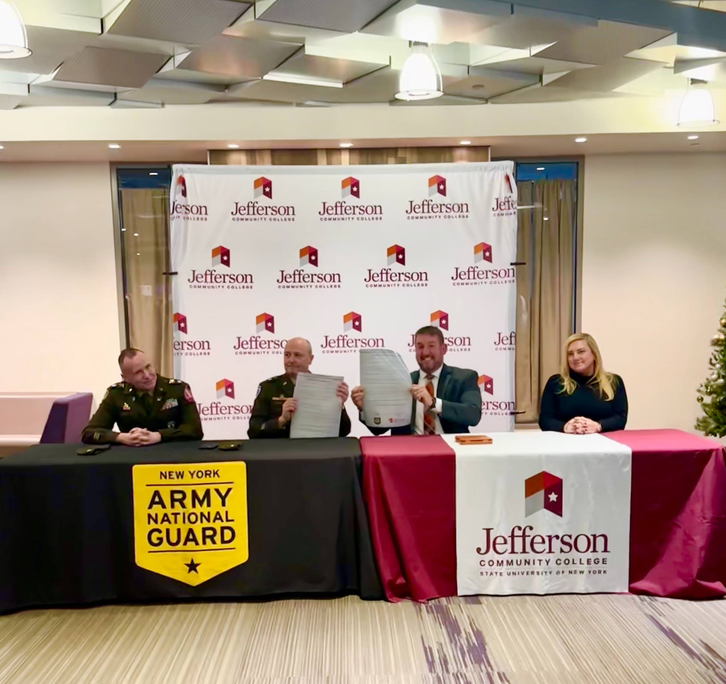 Image of Officials Signing Agreement